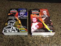 Two boxed sets of Elite Command die cast soldiers, World War II and Battle of Waterloo, shown side by side on a surface.