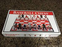 Closed box of Baseball Chess game with a red and white checkered board and baseball-themed chess pieces shown on the cover.