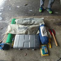 Overview of all items laid out on carpet and floor