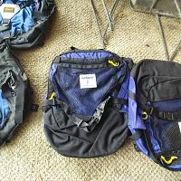 Top view of Kirkland pannier bags showing mesh pockets, adjustable straps, and zippers