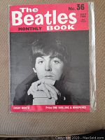 Front cover of The Beatles Monthly Book No. 36 from July 1966 featuring black and white photo of Paul McCartney
