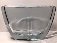 Front view of the diamond-shaped thick glass vase showing its form and original sticker on the front bottom edge.