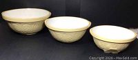 Set of three nesting Cane-colored Gripstand mixing bowls from TG Green Ltd, showing exterior pattern and sizes