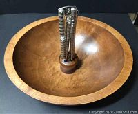 Maple wood nut bowl with nutcracker and metal picks displayed inside the center holder