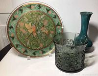 Photo showing whole lot with Orrefors bowl, pheasant plate, and Blue Mountain Pottery vase.