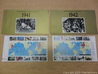 Two commemorative stamp sets with covers and full sheets displayed for 1941 and 1942 World War II anniversary.