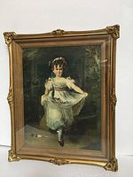 Full view of the vintage framed portrait showing the entire image and ornate gold frame.