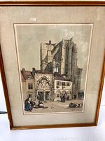 Full view of the framed lithograph showing the cathedral and gateway scene with figures in front