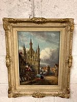 Full view of framed painting showing gilded decorative frame and scene