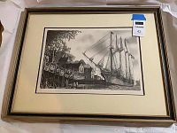 Full view of the framed and matted etching depicting a clipper ship at dock, showing the frame, mat, and artwork.