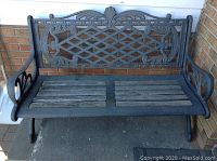 Full front view of bench showing frame design and wood seating