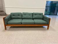 Front view showing teak frame and three seat cushions