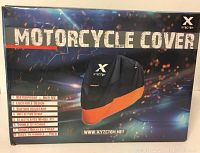 Front packaging photo showing brand XYZCTEM and product name Motorcycle Cover