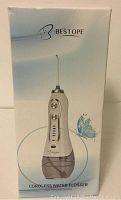 Box of Bestope cordless water flosser showing the device on front of packaging