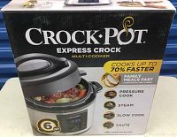 Box of the Crock-Pot Express Crock multi-cooker showing brand, model, and key features like 6-quart size and multiple cooking functions.