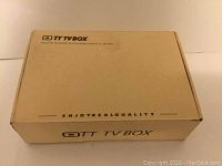 Closed cardboard packaging box labeled OTT TVBox Home Media Entertainment Center.