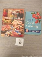 Photo of two cookbooks side by side on a wooden surface, showing titles and covers: 'Company's Coming Weekend Cooking' and 'A Guide to Good Cooking' with visible wear on the second book.