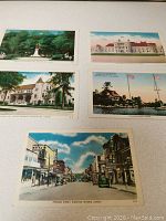 Front side showing all five vintage postcards from Kingston area, including Princess Street and City Hall.