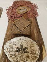 Small beaded change purse with white and bronze beadwork and metal chain