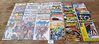 Photo showing full layout of assorted comic books front covers, including Solar and Wildstar.