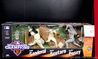 Front view of the McFarlane Toys San Francisco Giants 3-pack original box showing three figures and trophy