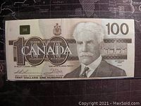 Front side of the 1988 $100 bill showing portrait and denomination