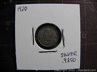 Reverse side of the 1920 Canadian 5 cents silver coin showing the denomination, crown, and silver purity mark.