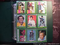 First page of hockey cards in binder, showing nine cards with player images and green borders, including Gary Edwards, Craig Ramsay, Dave Burrows, Brian Glennie, and Tim Ecclestone.