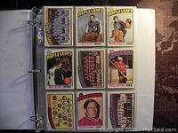 Photo showing the first nine hockey cards in the collection featuring Maple Leafs, Canadiens and Black Hawks players and team photos.