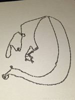 Vintage 22 inch sterling silver chain necklace laid out on a beige surface, showing the twisted link design and clasp.