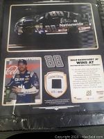 Front view of the Dale Earnhardt Jr. limited edition plaque showing race car, driver photo, number 88, limited edition number plate, and text about his Daytona win.