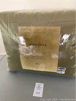 Photo of the sealed packaging showing Highgate Manor Enchantment 9 piece comforter set in queen size with labeled tag