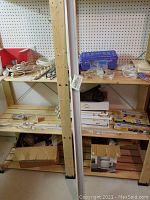 First photo shows shelving units with various items including white extension cords, boxes, and plastic containers.