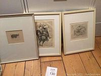 Three framed pen and ink artworks by Read showing cow, horse, and cat