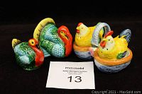 Five-piece lot of vintage salt and pepper shakers depicting 1940s chicken and turkey figures, brightly painted and glazed ceramic.