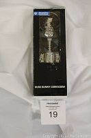 Full view of the original black box packaging labeled with Warner Bros. Studio Store and Bugs Bunny Corkscrew text. Box is worn but unopened.