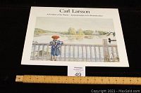 Carl Larsson portfolio cover showing title 'A Portfolio of Six Works' with a watercolor print of a child by a railing looking out over a river scene.