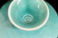 Photo showing the bottom interior of the ceramic cake pedestal with the 'Germany' mark and identification numbers.