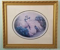 Front view of the framed Icart print "Hortense" showing the detailed ornate gold frame and the oval pastel artwork of a woman surrounded by blue flowers.