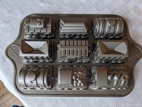 Top view of Nordic Ware 5 cup train cake pan showing detailed train mold sections including engine and cars.