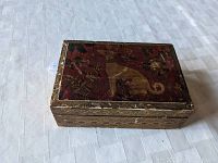 View of closed rectangular papier mache box with hand-painted whippet dog on lid, showing overall condition and design.