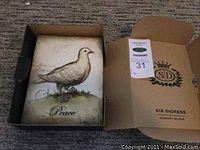 Block and original box laid flat showing front artwork and packaging