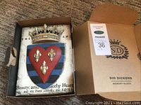 Memory block in original box next to shipping carton showing Sid Dickens logo