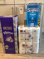 Photo showing packed Kleenex Ultra Soft tissues, Scotties Original tissues, and 365 Everyday Value Sustainably Soft bath tissue packs.
