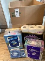 Photo of the full lot including packages of Purex toilet paper, Kleenex tissues (Ultra Soft and Everyday), and Royale 3-ply tissue boxes