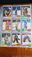 Photo of 9 hockey cards from 1980-81 OPC series including players from Canucks, Capitals, Jets, Whalers, Rangers, Islanders, North Stars