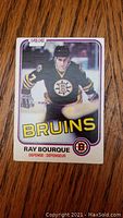 Front of 1981-82 O-Pee-Chee hockey card featuring Ray Bourque in Bruins uniform.
