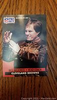 Front of the 1991 Pro Set NFL rookie card showing Bill Belichick in Cleveland Browns jacket.