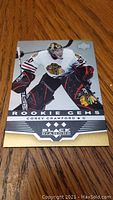 Front view of the Corey Crawford Rookie Gems hockey card with player in Chicago Blackhawks gear.
