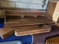 Disassembled desk top and drawer front laid flat